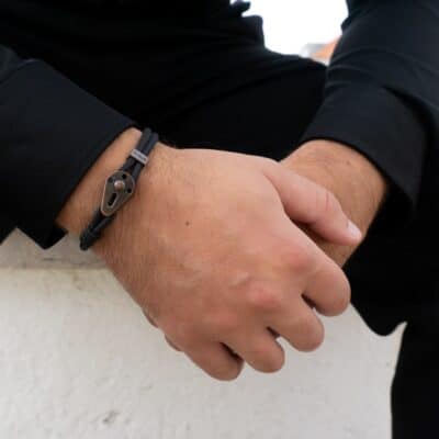 person wearing silver link bracelet