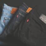 three assorted-color denim bottoms