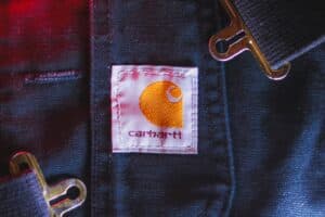 A close up of a person's shirt with a badge on it