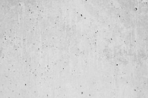 a black and white photo of a concrete wall