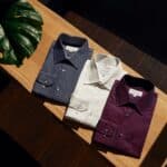 white button up shirt on brown wooden table