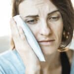 a girl with a toothache