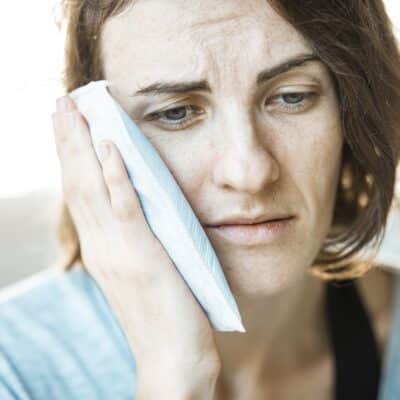 a girl with a toothache