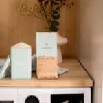 a white microwave oven sitting on top of a wooden counter